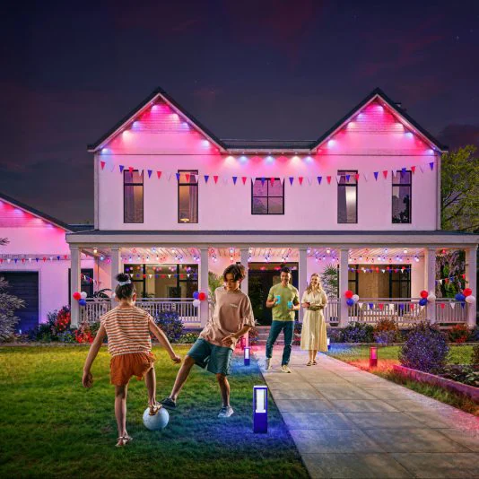 Home facade architectural lighting using Philips Hue wall washers and spotlights highlighting exterior features